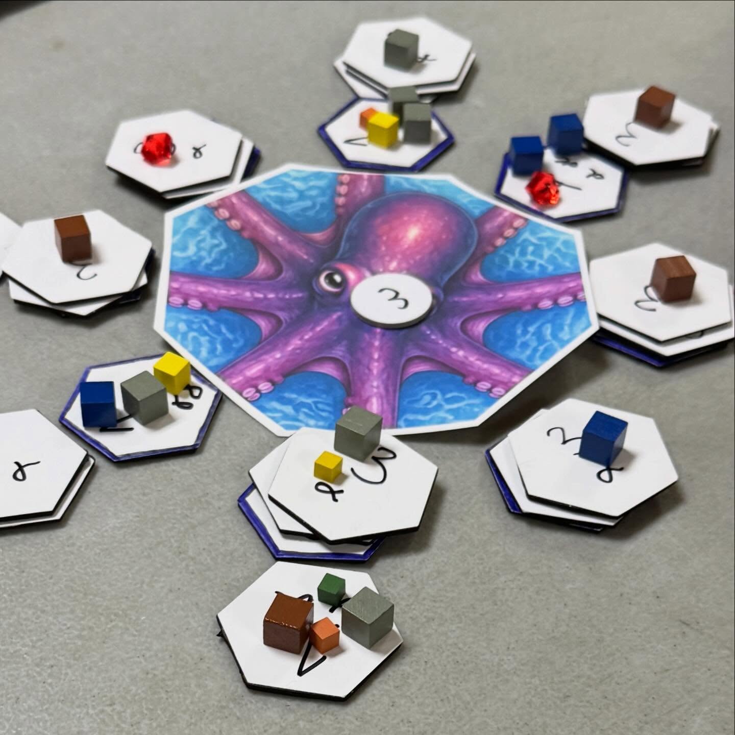 Back to designing a gateway game lesson 8: Moderate Interaction.

In Carcassonne, players can (sort of) interact if they try to get into the same City, or Road, but it definitely takes effort! In Splendor, players race for the same gem cards and to impress the nobles. 

In my game Within Reach (formerly OctoScape), players can engage the same arm segments and compete for food and position to elevate… but they can also choose not to. 

Keeping things friendly, or mostly friendly does lead to fun strategic play!

#gatewaygame #boardgamedesign #designinpublic #boardgamedev